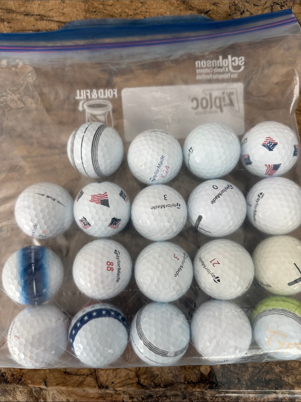 TaylorMade White Golf Balls with Red & Blue Flag Accents - 19 lot Pack
